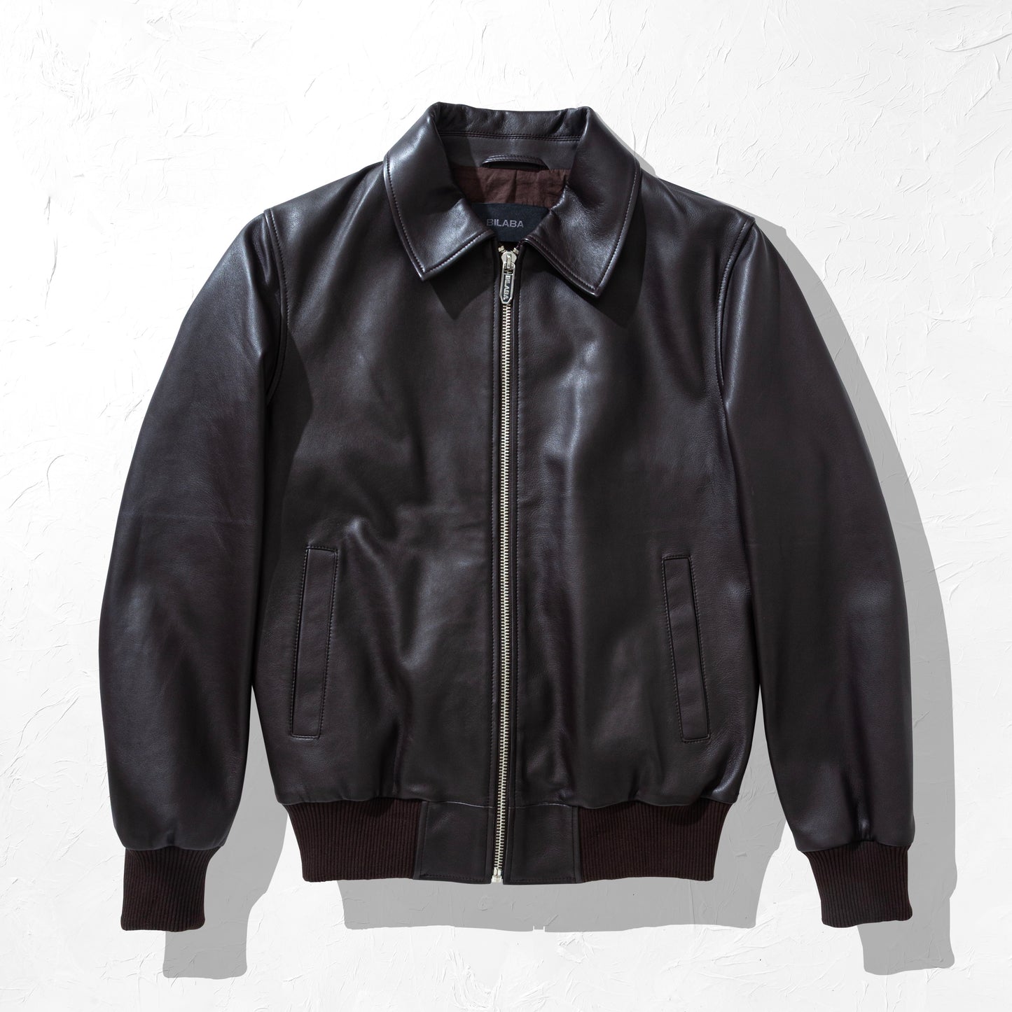 Brown Bomber Leather Bomber Jacket on a white background