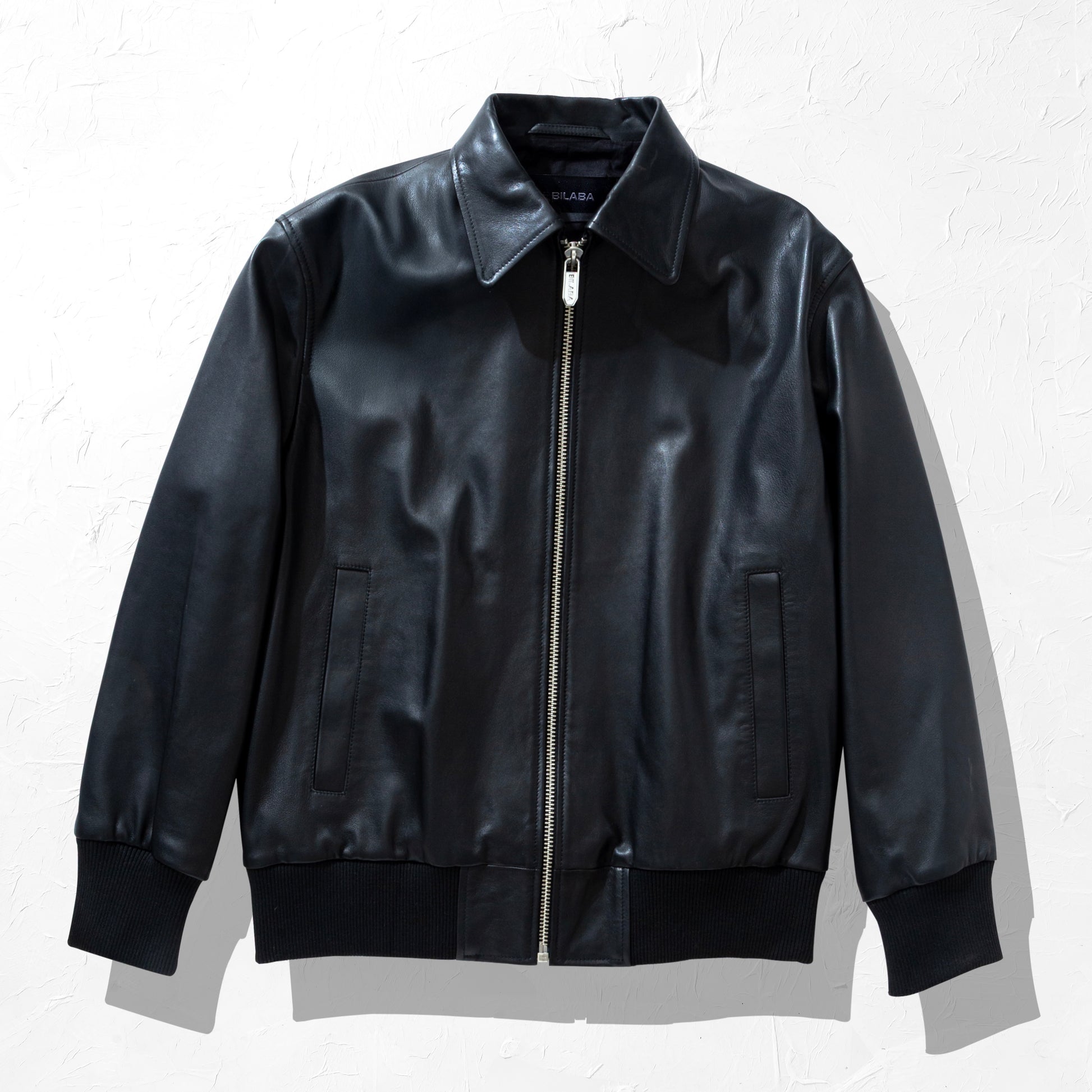 Black Collared Bomber leather jacket on a white background