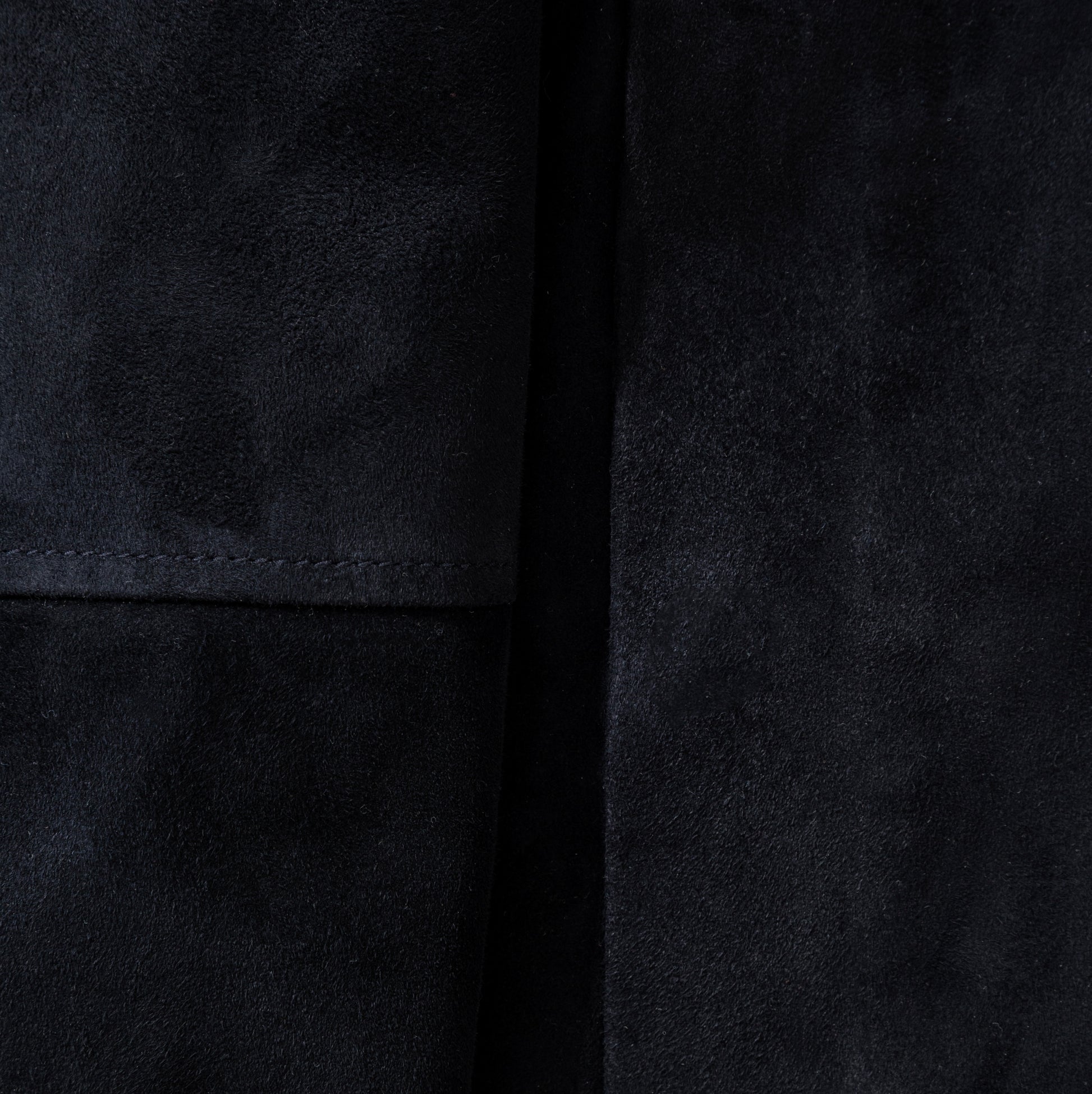 Close-up of a dark navy fabric texture